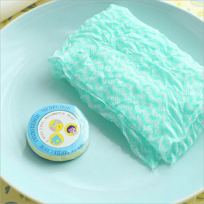 10 pieces of 100% cotton compressed washcloths with a lightweight, woven towel set featuring a polka dot design, character theme. Portable and quick expandable oblong shape for travel and home use.