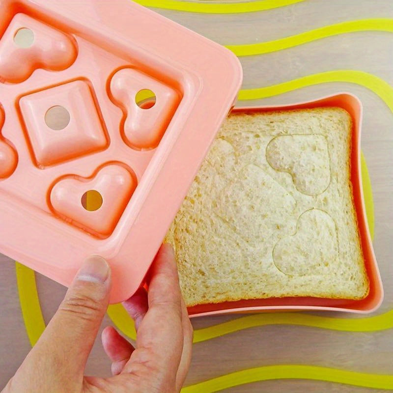 Create heart-shaped mini sandwiches effortlessly with the 1pc Heart-Shaped Mini Sandwich Cutter & Sealer. This DIY tool is perfect for making pocket sandwiches, snacks, and party platters with ease. It is durable, portable, and requires no electricity to