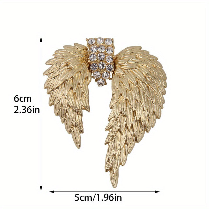 Luxurious and elegant brooch pin featuring golden-winged feathers adorned with sparkling rhinestones - a unique accessory that adds a touch of retro glamour to any outfit. Perfect for women who appreciate timeless style and sophistication.