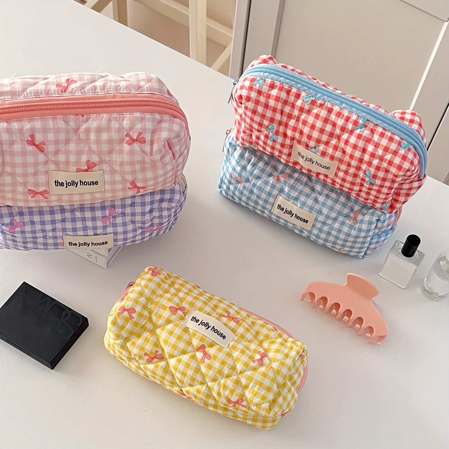 Polyester plaid pencil case with bowknot design for women and girls.