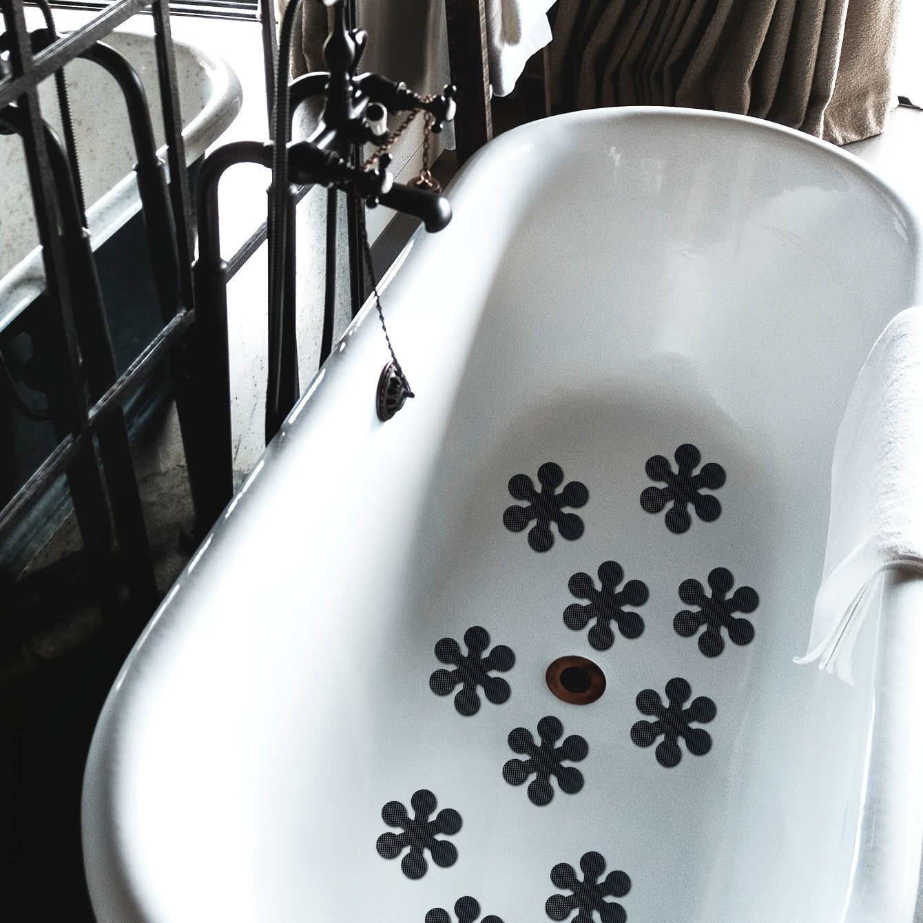 Non-Slip Flower-Shaped Bathtub Stickers - Set of 10 adhesive decals for shower, bathroom floor, and stairs. Easy to apply, line-dry, and made from durable material.