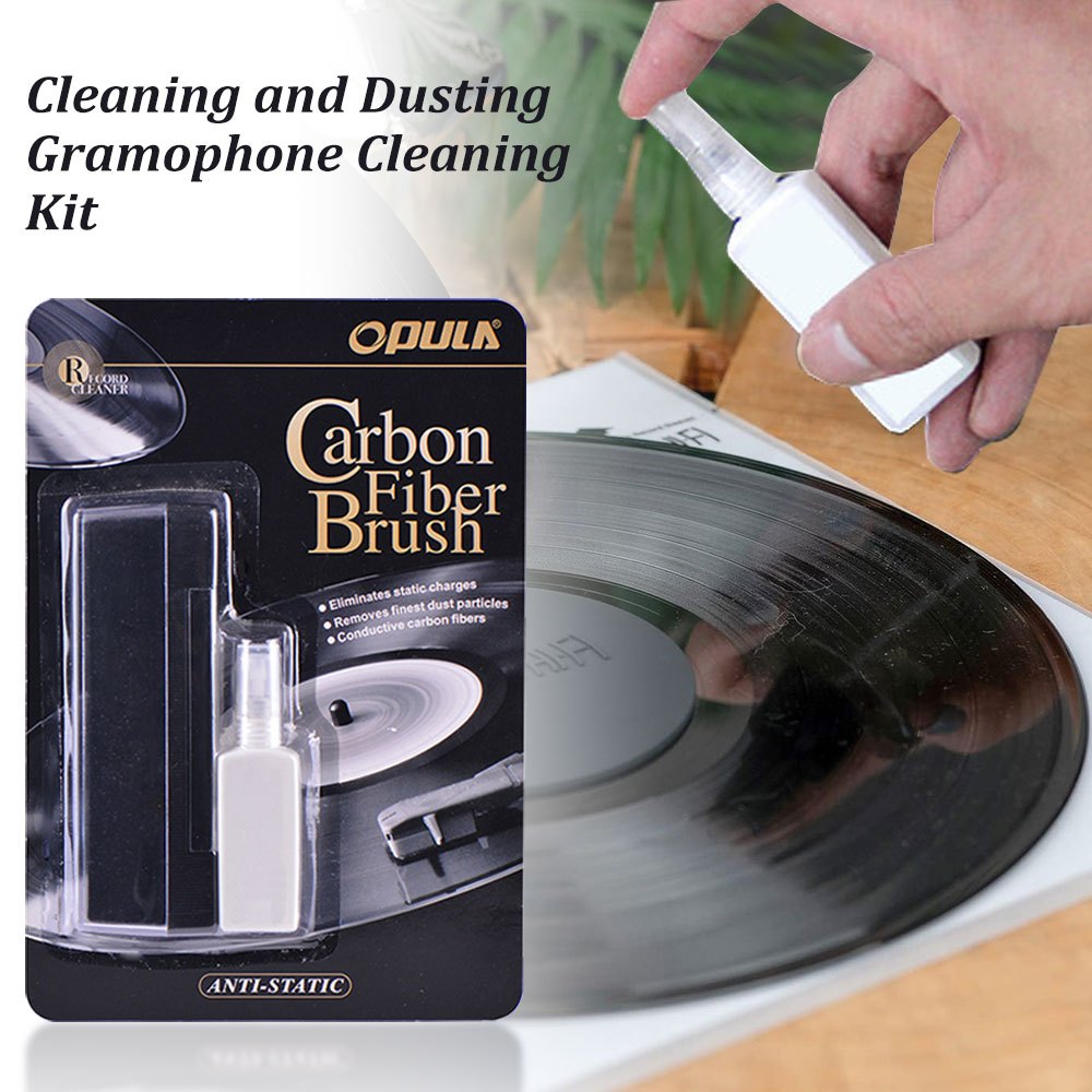 Vinyl record cleaning kit with anti-static plastic brush and cleaner for record players and gramophones. Made of uncharged, durable material.