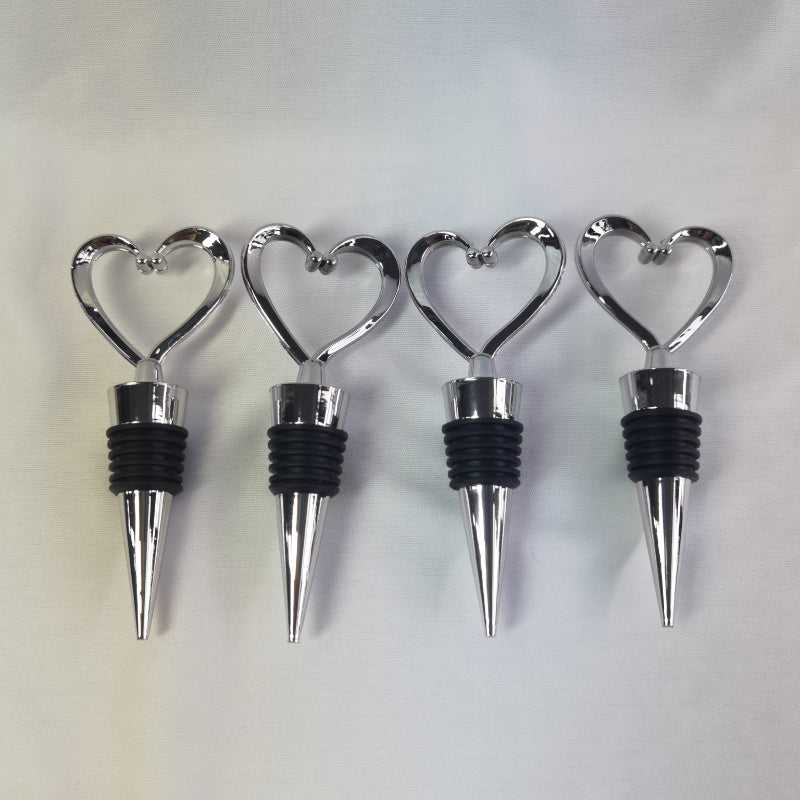 Hot selling heart-shaped red wine bottle stopper made of plastic and silicone, 1-8 pieces available.