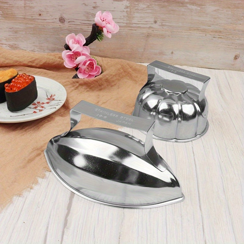 This durable and corrosion-resistant cookware is a stainless steel rice mold with a handle, perfect for making food-grade rice and vegetable rolls. One piece is included in this set.