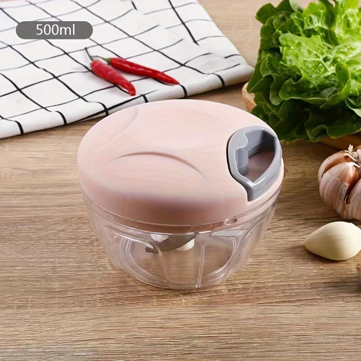 Get your hands on the versatile Manual Garlic Press & Vegetable Chopper! Made with a durable stainless steel blade and a spacious 500/900ml capacity, this kitchen gadget is perfect for chopping onions, meat, and more. Say goodbye to tedious chopping and