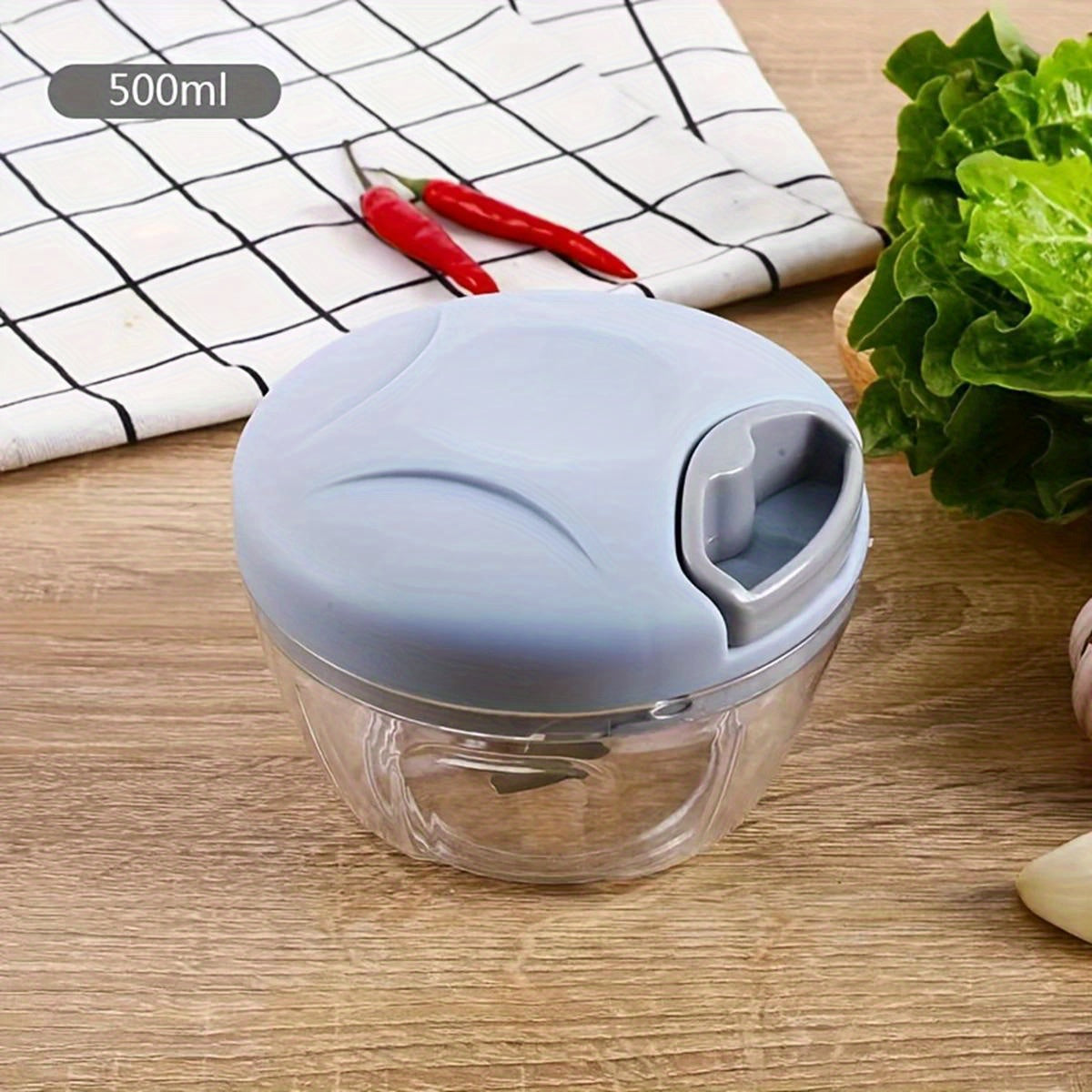 Get your hands on the versatile Manual Garlic Press & Vegetable Chopper! Made with a durable stainless steel blade and a spacious 500/900ml capacity, this kitchen gadget is perfect for chopping onions, meat, and more. Say goodbye to tedious chopping and