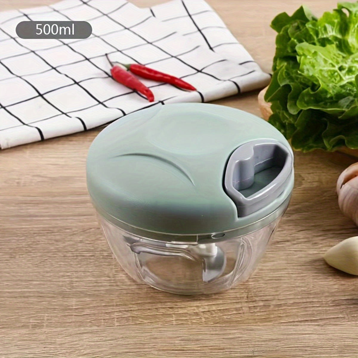 Get your hands on the versatile Manual Garlic Press & Vegetable Chopper! Made with a durable stainless steel blade and a spacious 500/900ml capacity, this kitchen gadget is perfect for chopping onions, meat, and more. Say goodbye to tedious chopping and