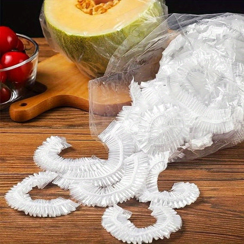 Transparent, retractable freshness protectors for leftovers, fruits, and vegetables made from thickened disposable plastic wrap - set of 100 pieces. Ideal for storing in the kitchen refrigerator and on the counter.