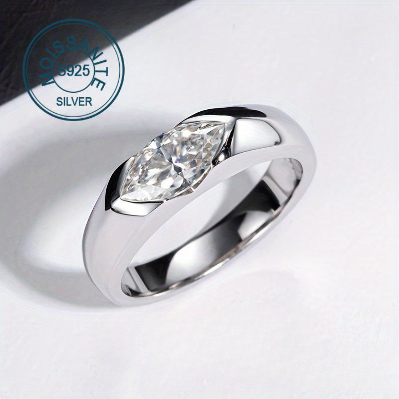 Stunning 1 Carat Moissanite Engagement Ring in 925 Sterling Silver featuring an Olive Cut Gemstone. Ideal for Proposals and Weddings, this ring comes with a Gift Box and has a Half-bezel design. Perfect for any occasion - from parties to weddings, this