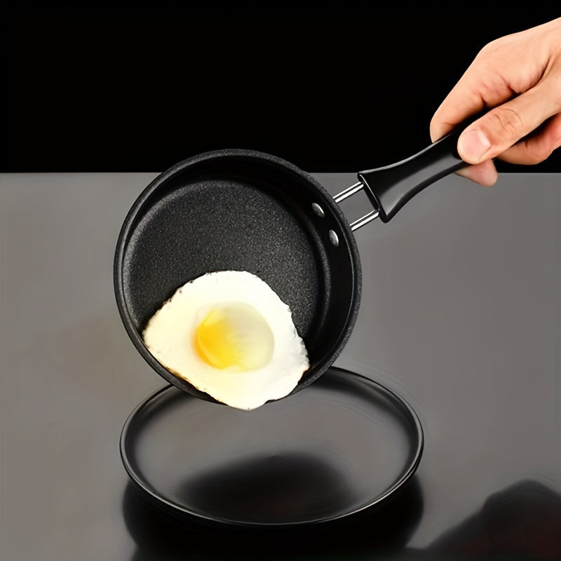 A compact and convenient 1 piece Portable Mini Non-Stick Egg Frying Pan suitable for both Induction Cookers and Gas Stoves. Ideal for cooking breakfast, lunch, dinner, and outdoor meals. Perfect for both kitchen use and camping trips.