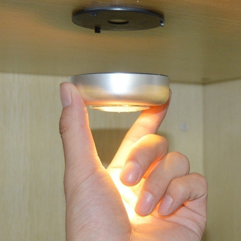 Touch light with 3 LEDs for cabinets and hallways, no batteries included.