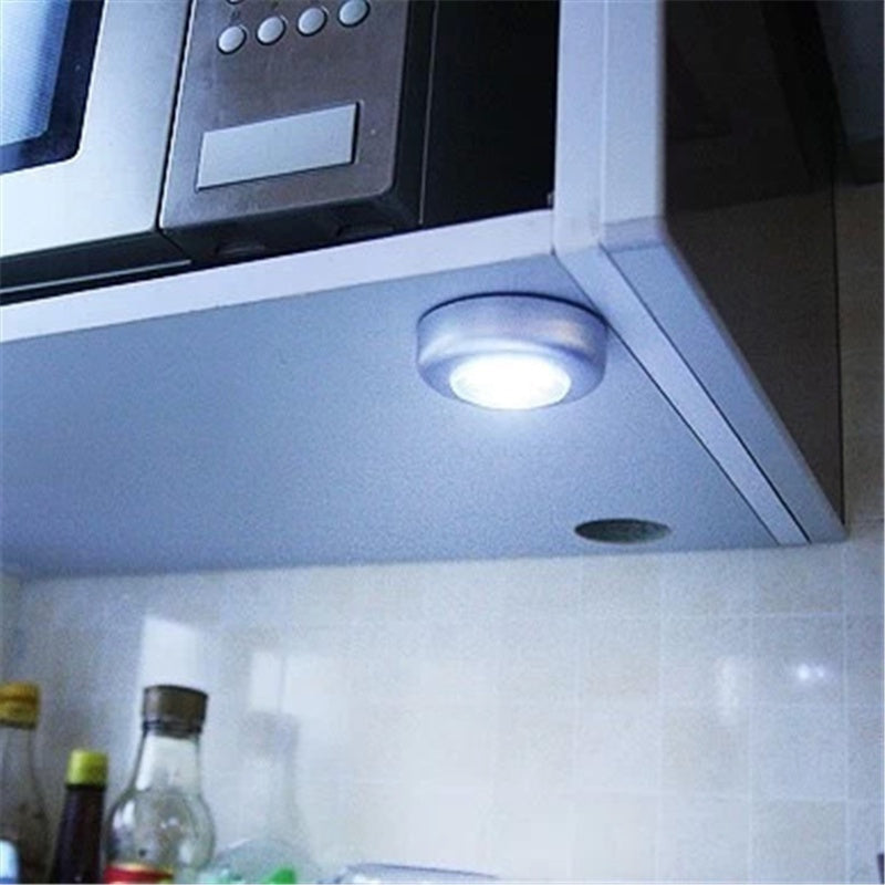 Touch light with 3 LEDs for cabinets and hallways, no batteries included.