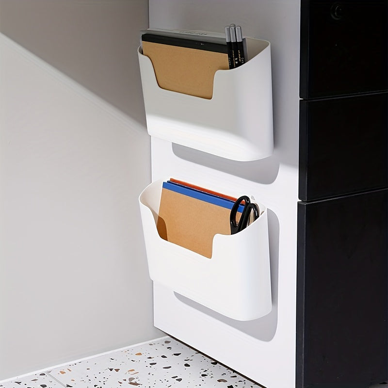 Wall-mounted storage holder with adhesive backing for under-sink organization, suitable for kitchen or bathroom use. Plastic shelf that requires no drilling for installation.