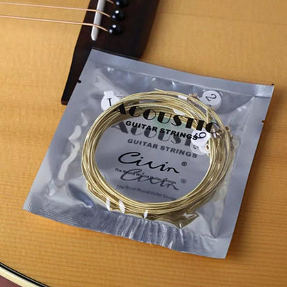 1 Set of 6 Goldbronze acoustic classical guitar strings with roundwound, coated, and polished finish for durability and warm tone.