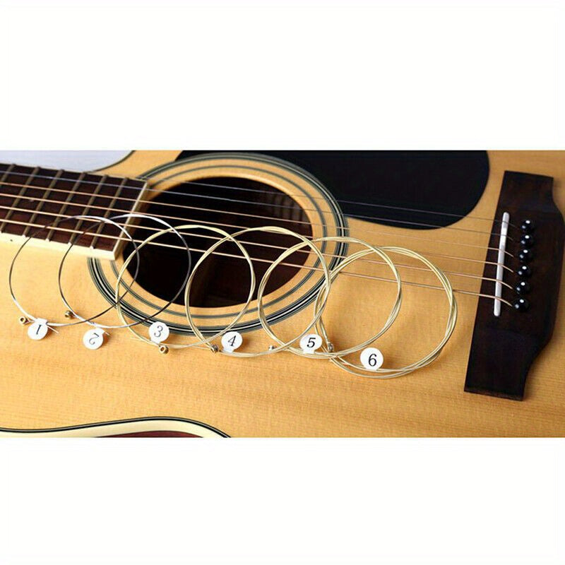 1 Set of 6 Goldbronze acoustic classical guitar strings with roundwound, coated, and polished finish for durability and warm tone.