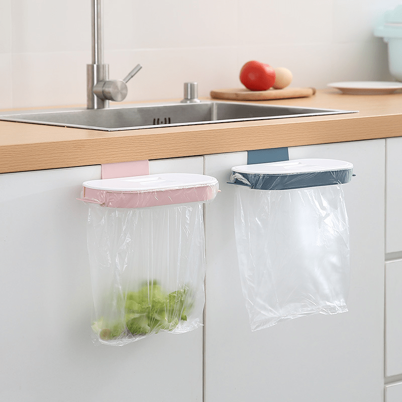 Portable plastic kitchen garbage bag holder with lid, no power needed, square shape, hangs on cabinet door.