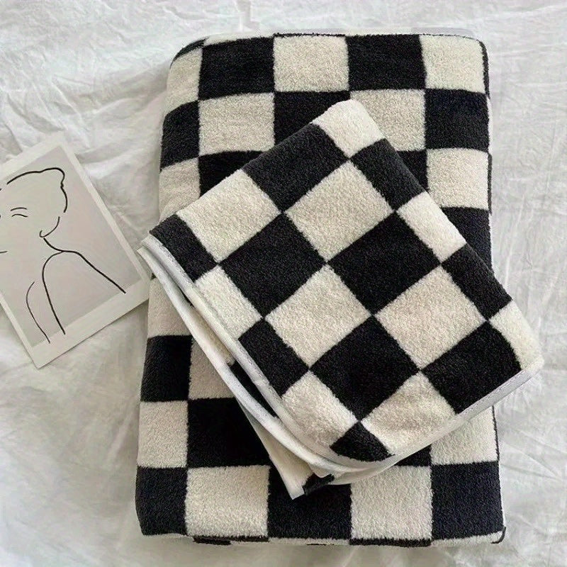 Soft skin face towel in checkerboard pattern, absorbent and comfortable for bathroom, gym, and kitchen.