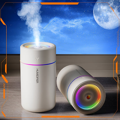 Portable multi-color LED aromatherapy humidifier for bedroom, office, and car.