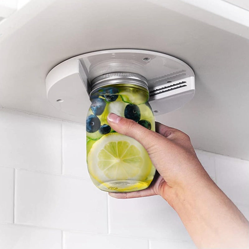 One-Piece EasyTwist Under Cabinet Jar Opener made of durable ABS material. This manual bottle lid remover allows for one-handed operation with no power required. A convenient kitchen tool for easy access to jars on the table.