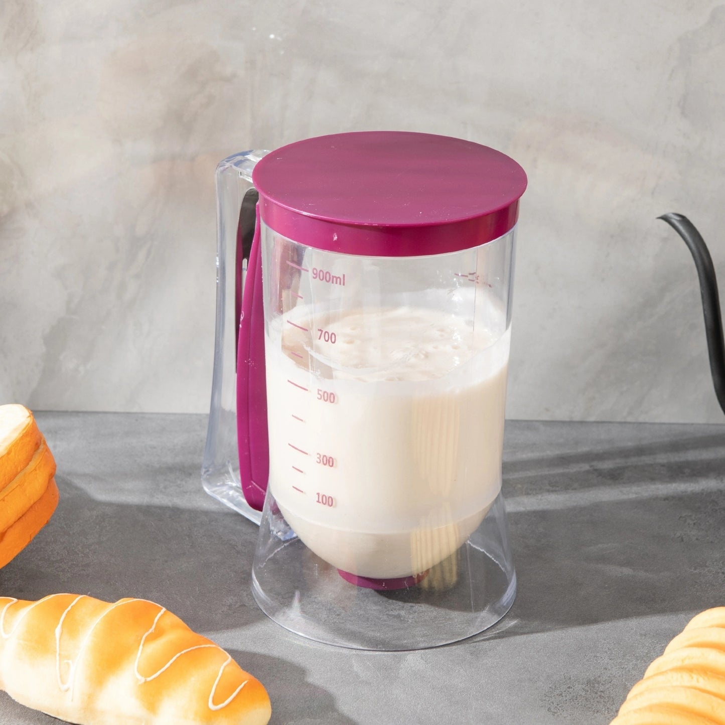 Durable cupcake batter dispenser with measurement markings, non-stick design for perfect baking, easy-to-clean plastic, food-safe.