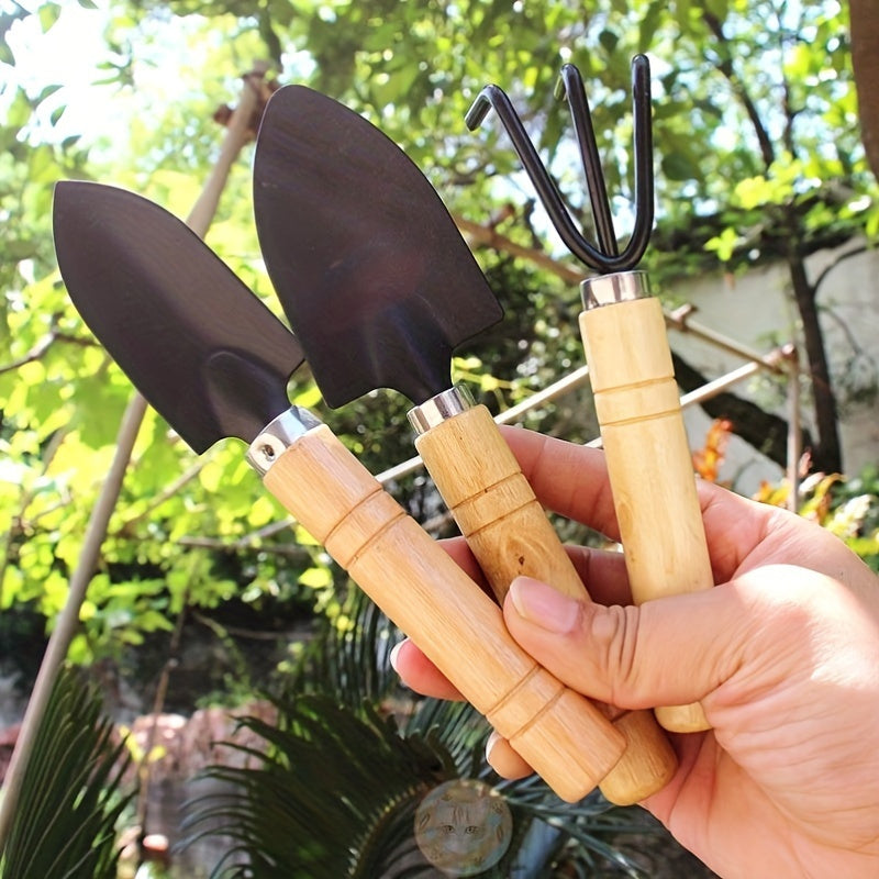 Succulent gardening tool set includes sturdy metal and wood hand tools for potting and planting without electricity.