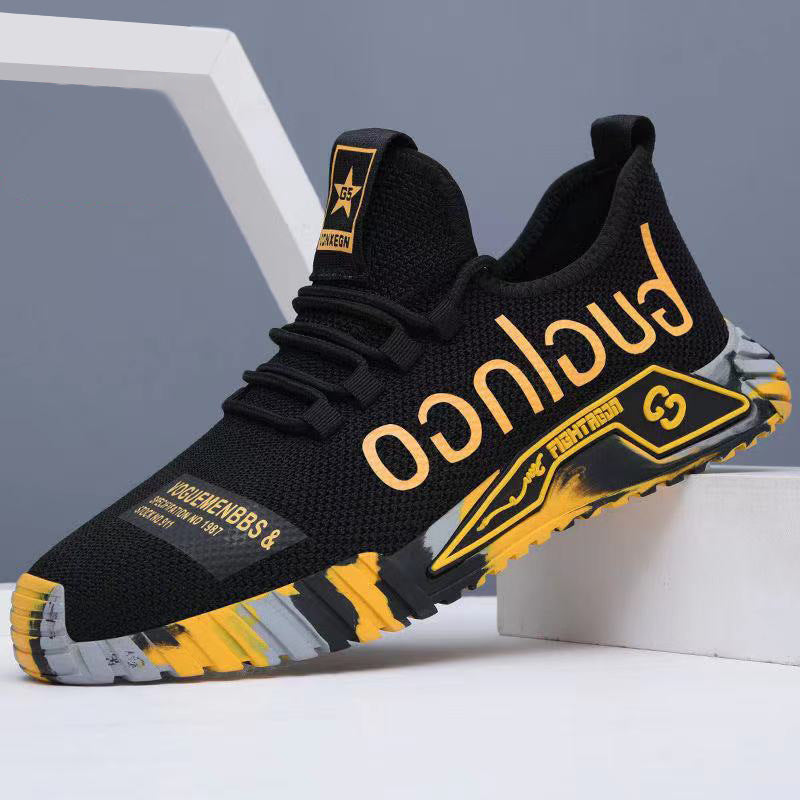 Breathable canvas running sneakers for men in black with teal accents. Lightweight with EVA sole and lace-up closure. Casual sporty design with letter print pattern and durable traction.