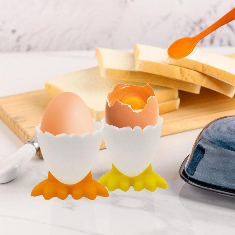 4 plastic egg cup holders with cartoon base design, perfect for boiled eggs. Durable, kid-friendly, and ideal for breakfast and parties.