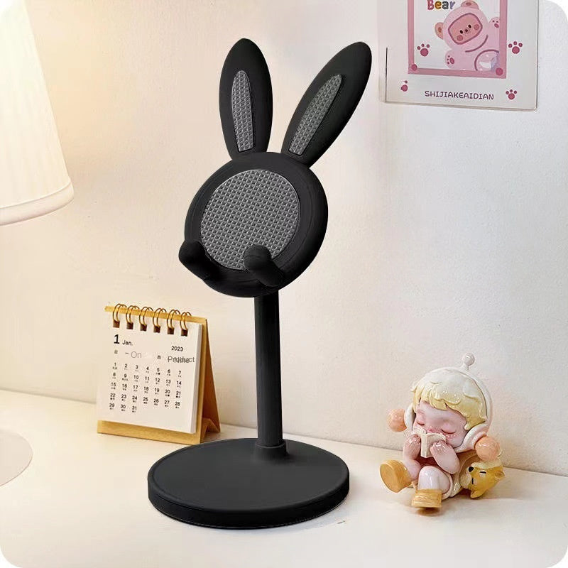 Versatile cute rabbit phone stand made of durable ABS material with adjustable height and stable grip. Universally compatible with Apple, Huawei, Samsung, Xiaomi, and more. Convenient and