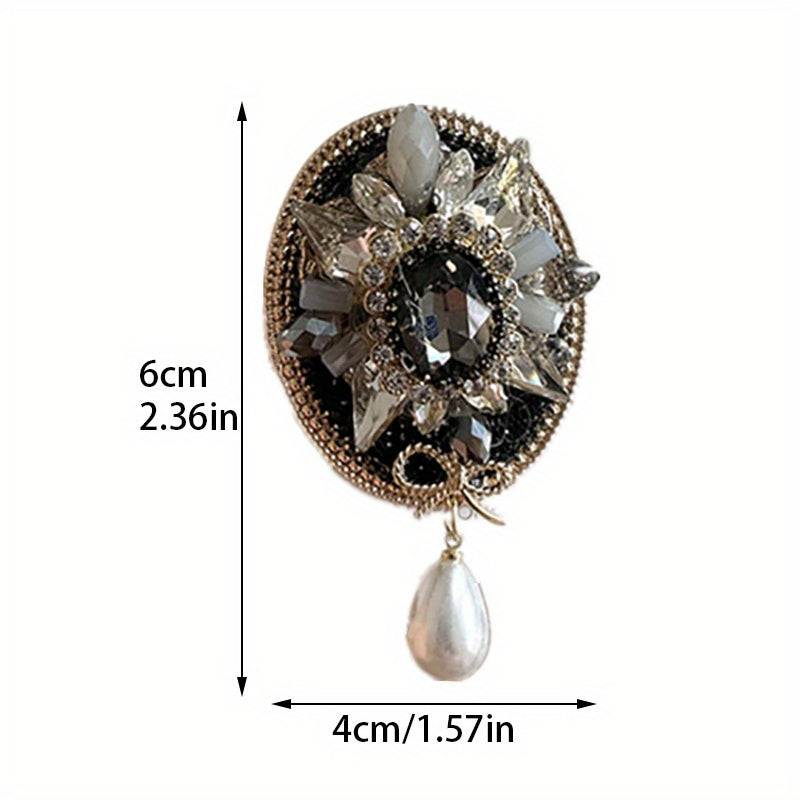 Stylish and Opulent Unique Brooch Adorned with Faux Pearl Pendant, Oval Design, Fashionable and Trendy Accent.