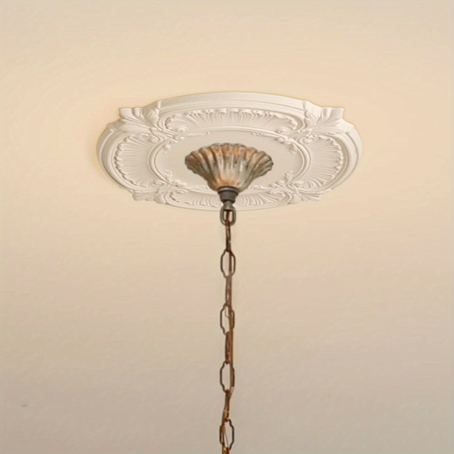 Luxurious white ceiling medallion is waterproof, moisture-resistant, and easy to install, ideal for lighting and fan decor.