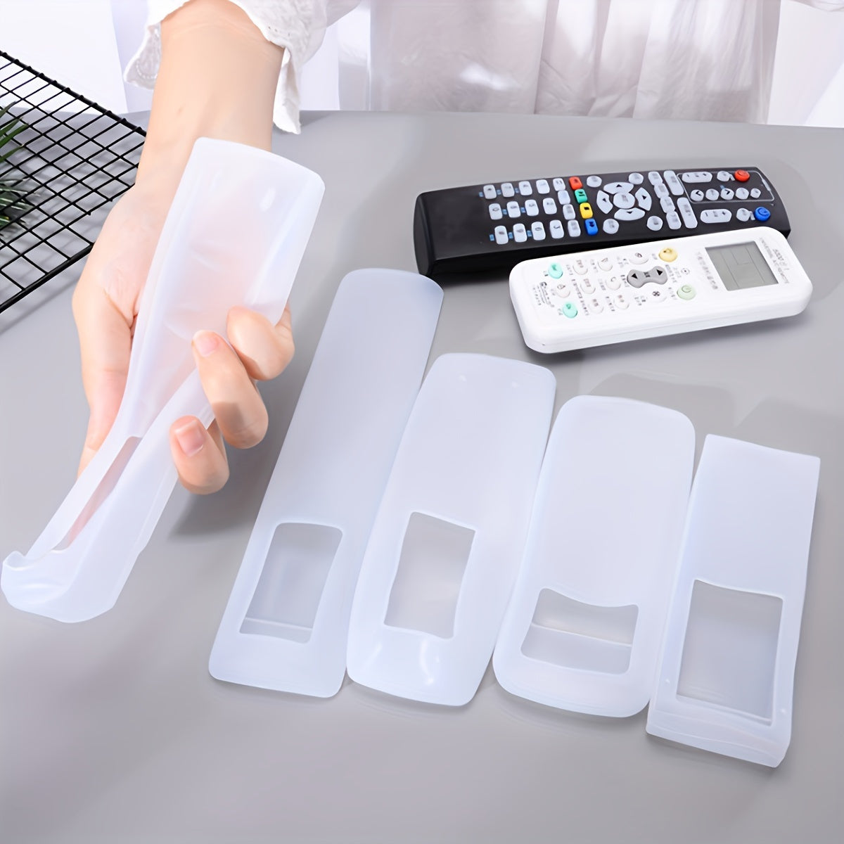 2023 Model silicone remote control case offers dustproof and waterproof protection, along with a stretchable transparent TV screen protector. This product is designed for use with home air