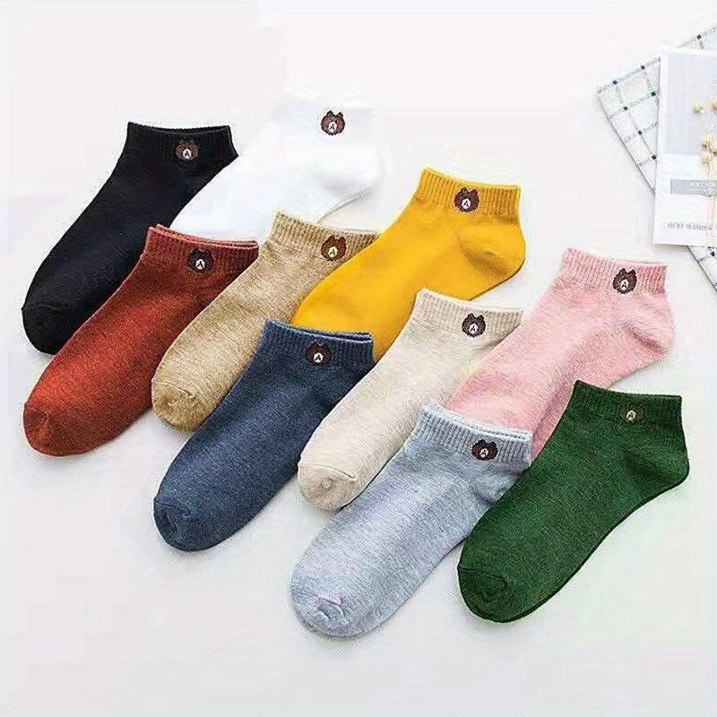 10 pairs of cute knit ankle socks with cartoon bear design for spring & autumn outdoor sports wear, made of polyester and machine & dry cleanable.