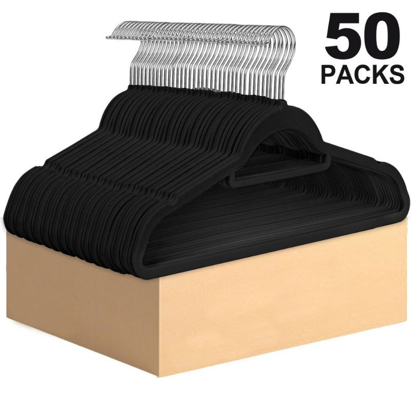 Get organized with a 50-pack of velvet hangers featuring a convenient tie bar, non-slip flocked felt design. These heavy-duty hangers are perfect for coats, pants, dresses, suits, and more, making them essential for home organization and storage.