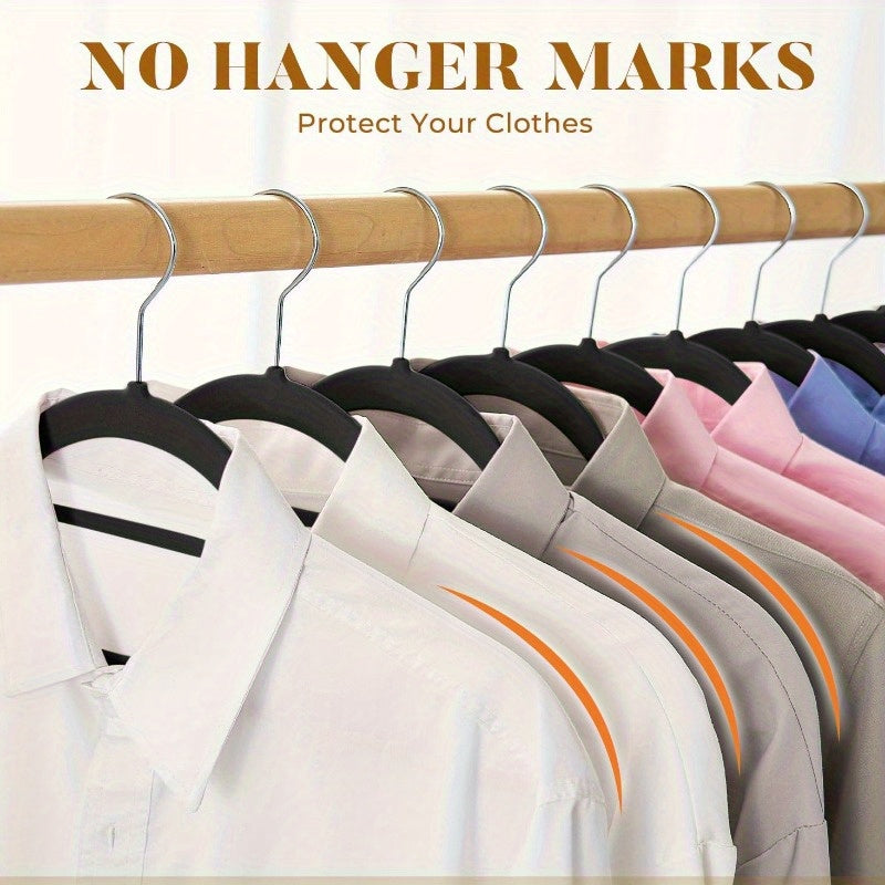 Get organized with a 50-pack of velvet hangers featuring a convenient tie bar, non-slip flocked felt design. These heavy-duty hangers are perfect for coats, pants, dresses, suits, and more, making them essential for home organization and storage.