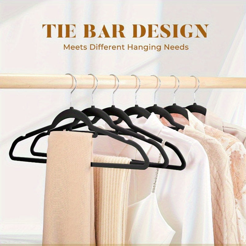 Get organized with a 50-pack of velvet hangers featuring a convenient tie bar, non-slip flocked felt design. These heavy-duty hangers are perfect for coats, pants, dresses, suits, and more, making them essential for home organization and storage.