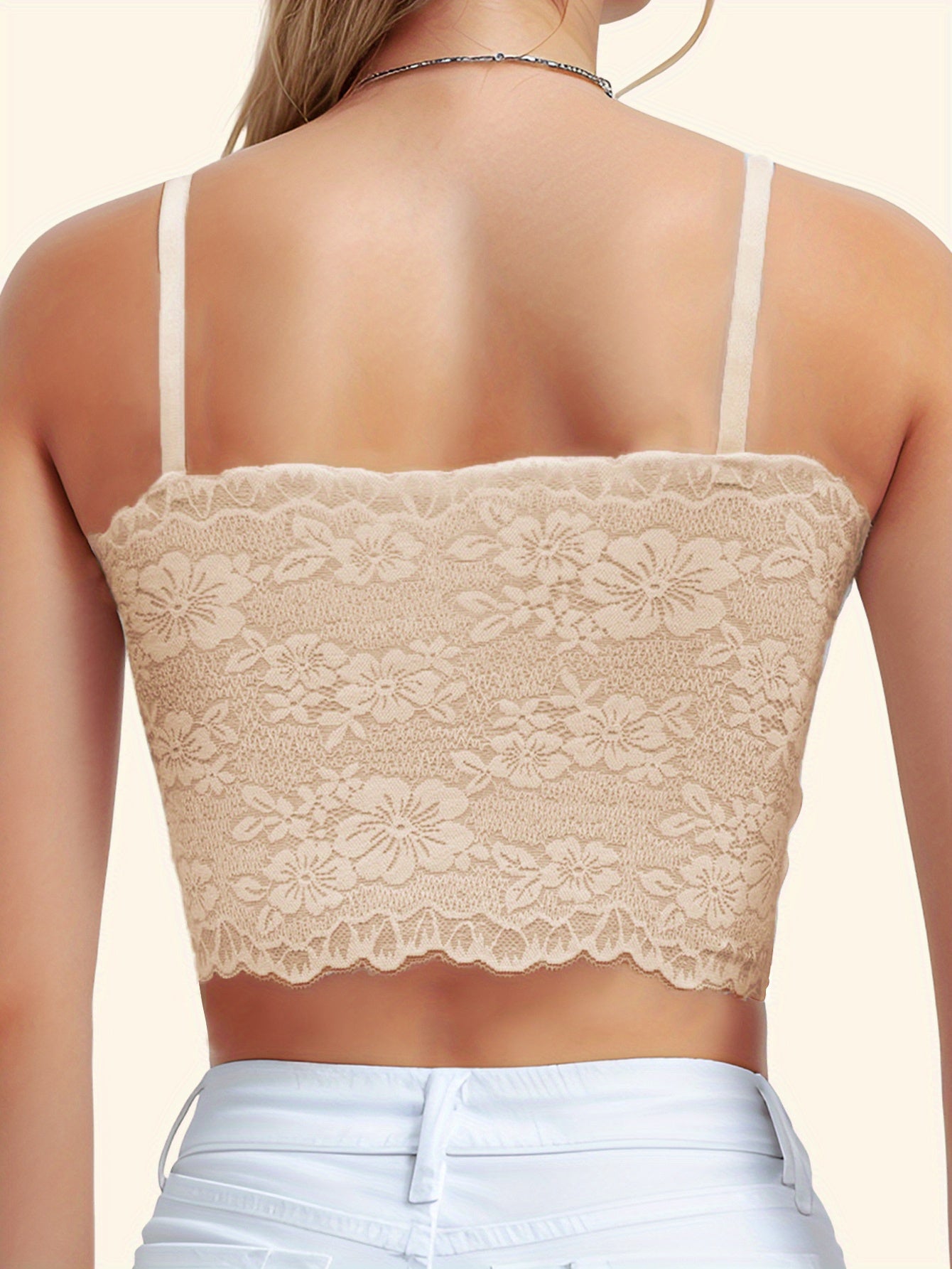 Women's wireless bra with removable pads and adjustable padding in a beige floral lace design. Features breathable and comfortable tank top style, made of seamless nylon lace fabric.