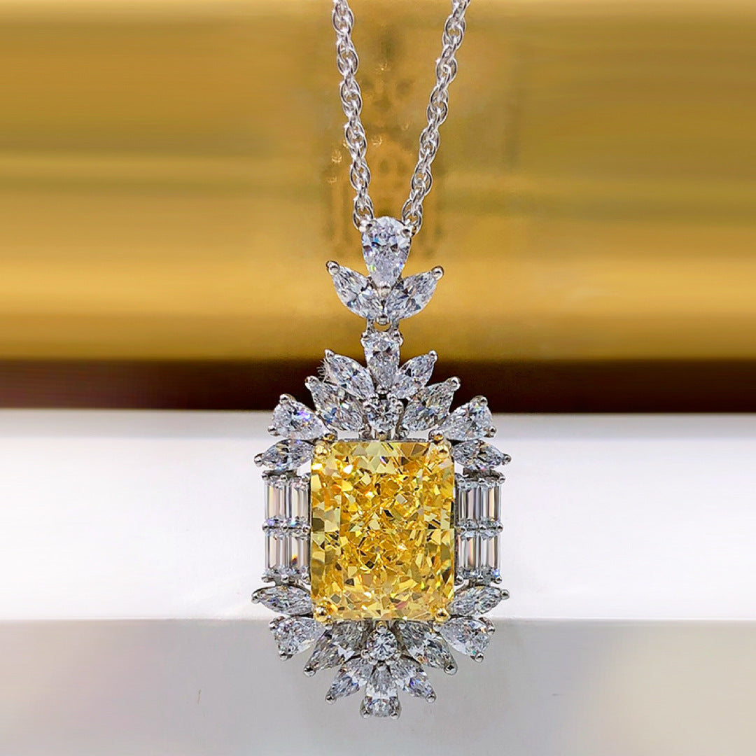 Sophisticated 925 Sterling Silver Pendant Necklace featuring a Radiant Cut Yellow Synthetic Gemstone and sparkling Cubic Zirconia accents. This uncoated piece is a glamorous addition to your everyday jewelry collection. A perfect Valentine's Day gift