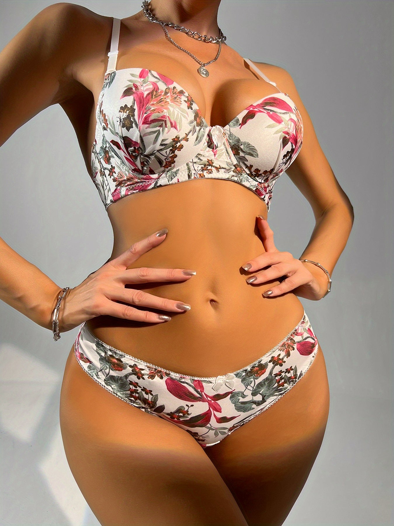 Floral print underwire push-up bra and thong set.