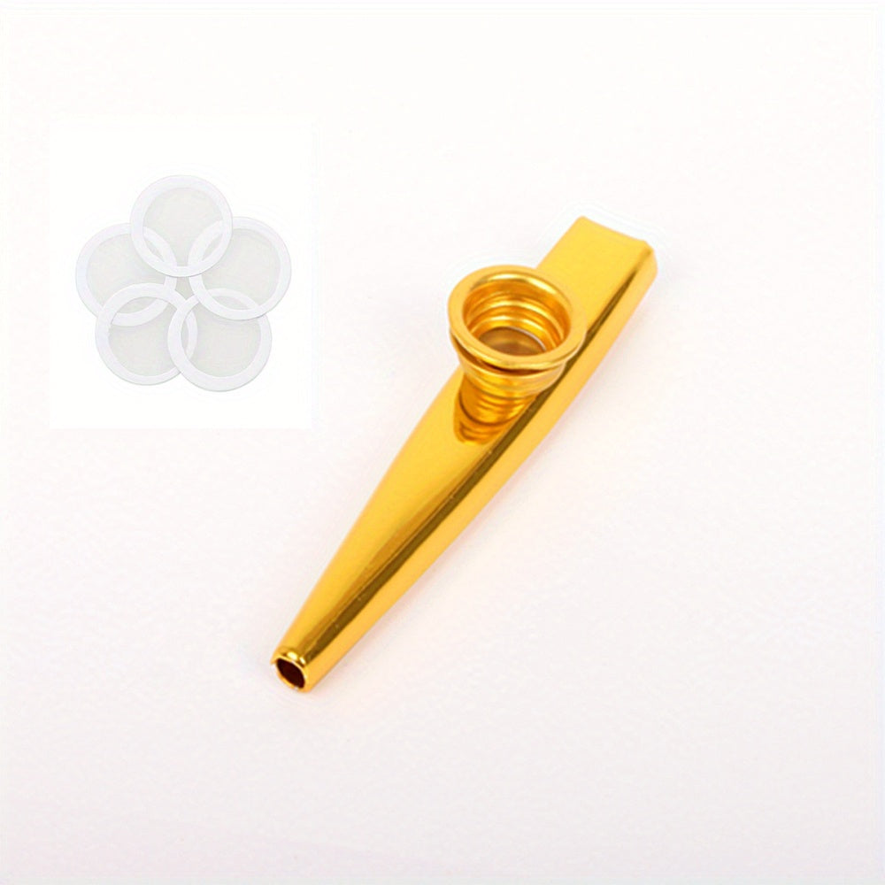 Golden kazoo with membrane for guitar.