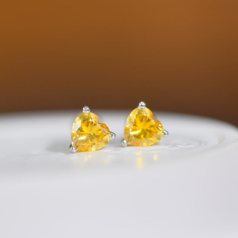 Celebrate Valentine's Day with these stunning 1ct heart-shaped yellow Moissanite stud earrings! Made of 925 sterling silver with vintage sexy styling, these earrings are perfect for all seasons, daily wear, and music festivals. The silver Moissanite