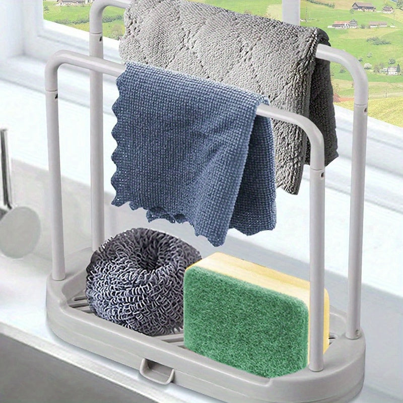 The "Grey Kitchen Sink Organizer" is a rust-proof countertop storage solution for sponges, dish cloths, and scrubbers.