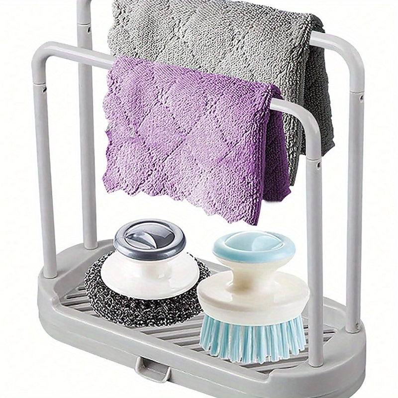 The "Grey Kitchen Sink Organizer" is a rust-proof countertop storage solution for sponges, dish cloths, and scrubbers.