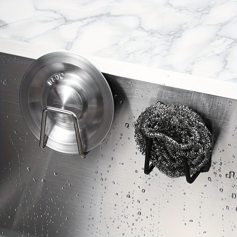 This wall-mounted stainless steel sponge rack is perfect for keeping your kitchen sink organized. No drilling required, making it convenient for use in the bathroom, toilet, or kitchen. This drain rack does not need electricity or batteries to function.