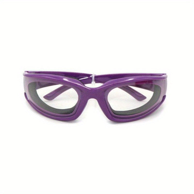 Kitchen Onion Cutting Goggles designed to protect eyes during chopping, made from anti-spicy material and splash-proof coating. Suitable for use in the kitchen to guard against eye irritation. Crafted from food-grade plastic for safety.