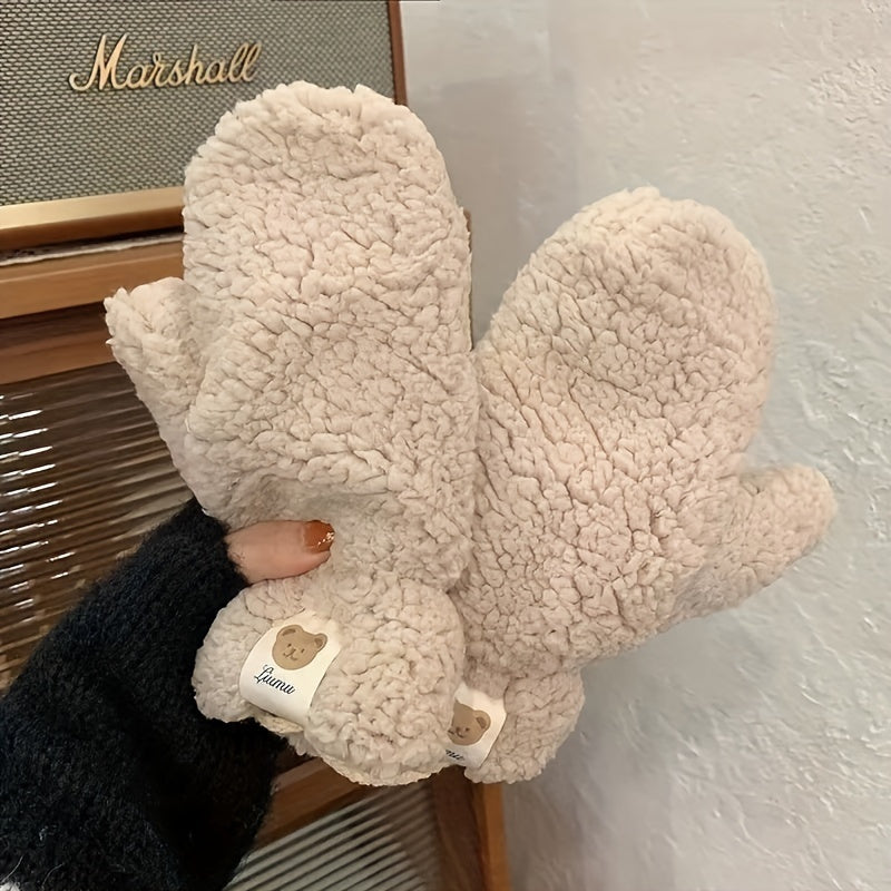 Extra thick polyester fleece mittens for women with a cute bear print design, perfect for keeping warm in the winter. These non-stretch gloves are ideal for casual outdoor wear and can be hand washed or dry cleaned. Featuring a cute animal pattern, these