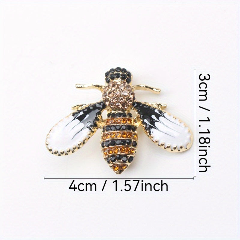 Charming and whimsical, this elegant and cute bee brooch pin features sparkling rhinestones. A delightful insect lapel accessory for women, it makes the perfect gift idea.