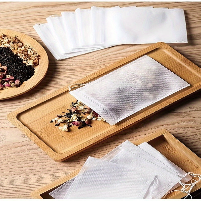 100 high-quality food grade non-woven tea bags for your favorite beverages - great for coffee, soup, and herbal infusions. Perfect for use at home or in restaurants.