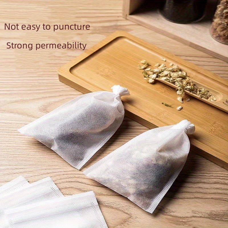 100 high-quality food grade non-woven tea bags for your favorite beverages - great for coffee, soup, and herbal infusions. Perfect for use at home or in restaurants.