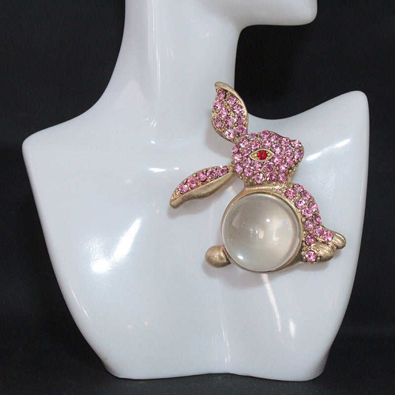 Stylish Bunny Brooch Pin adorned with Rhinestones - part of the Luxurious Glass Series, Featuring an Unconventional Irregular Shape for Coats & Accessories