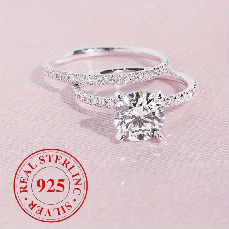 Stylish 2-Piece Stackable Wedding Band Set in 925 Sterling Silver, Adorned with Sparkling CZ Stones. Ideal for Engagement, Bridal, and Everyday Wear. The Perfect Valentine's Day Gift Featuring an Elegant and Versatile Design that Adds a Touch of Glamour